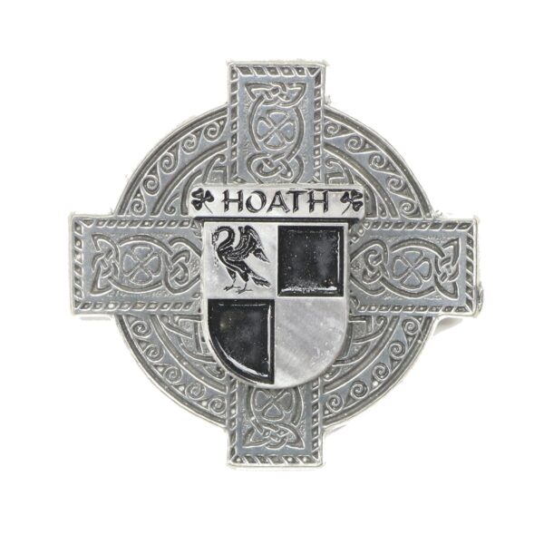 A Hoath Coat of Arms Pewter Cross Badge/Brooch designed as a celtic cross with the word hoath on it.