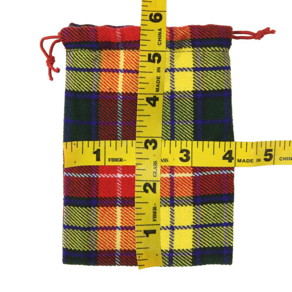 A Tartan Jewelry Gift Bag with a measuring tape.