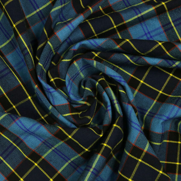 A close up of a blue and yellow plaid fabric.
