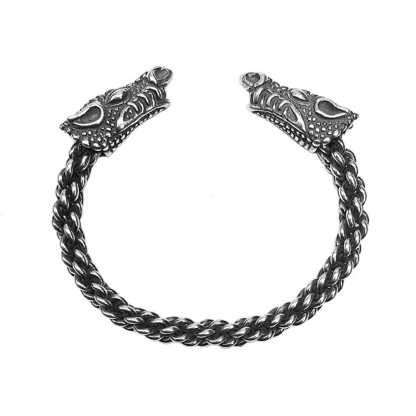 A Celtic Dragon Bracelet Light Braid - Size 5.5* with two viking heads on it.