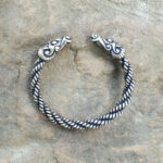 A Celtic Ram Torc Bracelet with a Viking Head.