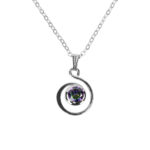 A Mystic Crystal Spiral Necklace adorned with a captivating purple stone.
