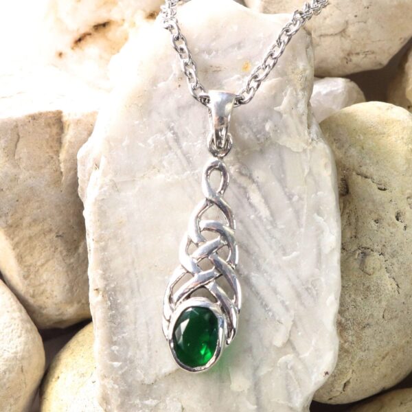 A Celtic Knot Emerald Earrings on a sterling silver chain.