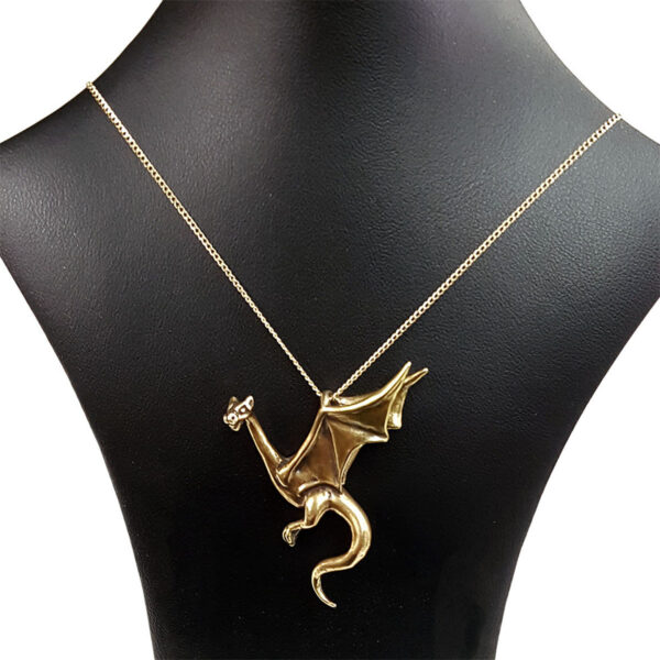 A Perched Wyvern Dragon Pendant on a mannequin.