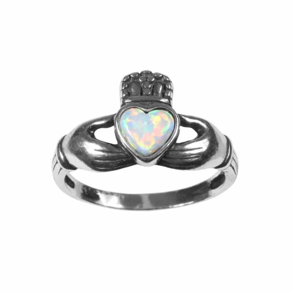 This beautiful Opal Claddagh ring features a heart-shaped opal stone set in a stunning silver band.