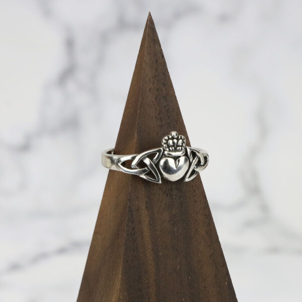 Sterling silver claddagh ring with a Two Tone Eternity Knot Band.