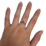 A woman's hand showcasing a Traditional Claddagh Ring.