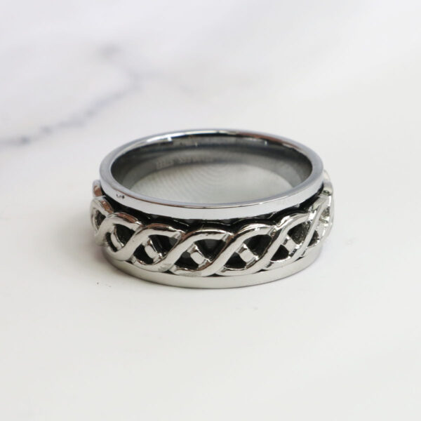 A Celtic Knot Spinner Ring-Size 13 with a knot design.