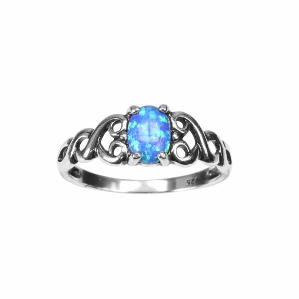 A Heart Knot Blue Opal Sterling Silver Ring with a heart-shaped blue opal stone.