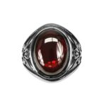 A Dragon's Eye Ring with a red stone.