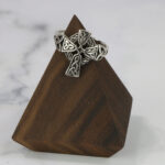 Two tone Celtic cross ring with a Two Tone Eternity Knot Band in sterling silver.