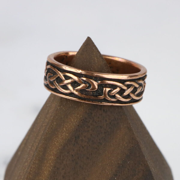 Copper Celtic Knot Ring in rose gold with knot design.