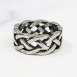 An Interlacing Endless Knot Ring with a Celtic design.