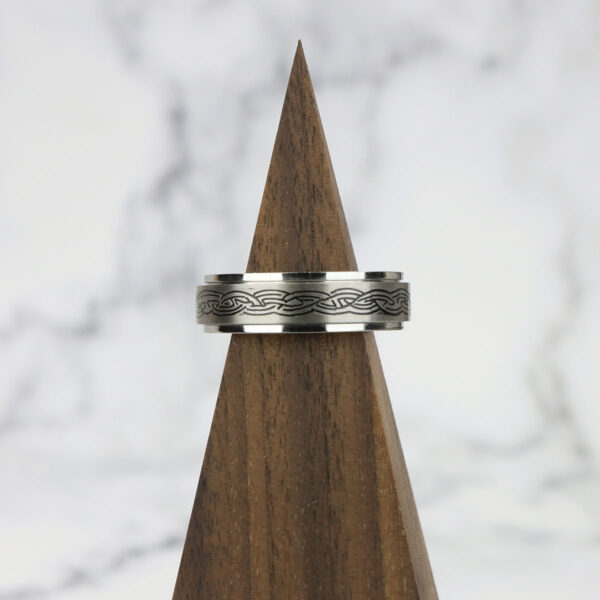 The stainless steel Celtic Knot Spinner Ring is the perfect choice for fans of "The Lord of the Rings" who want a unique wedding ring.