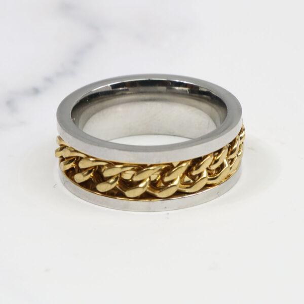 A gold and silver Two Tone Celtic Braided Ring.