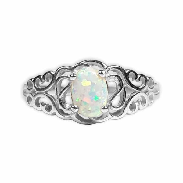 An exquisite Opal Filigree Ring adorned with intricate filigree designs.