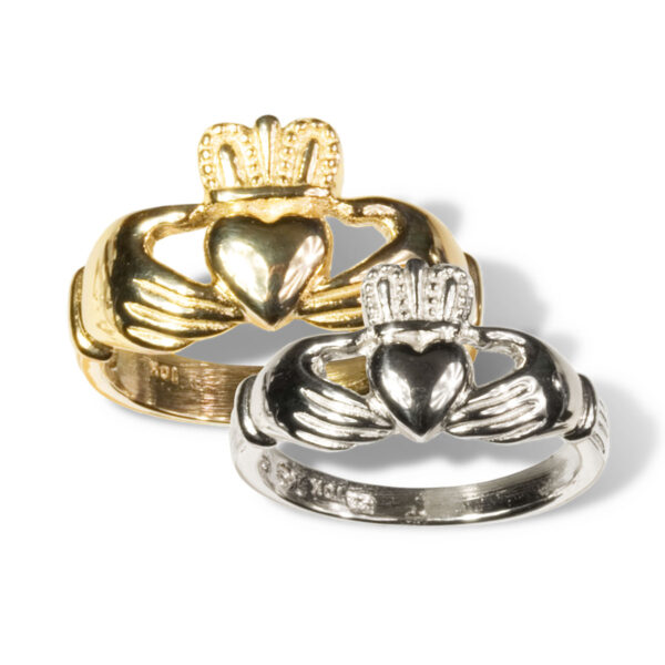 Two gold and silver claddagh rings, including one Women's Sterling Silver Claddagh Wedding Ring.