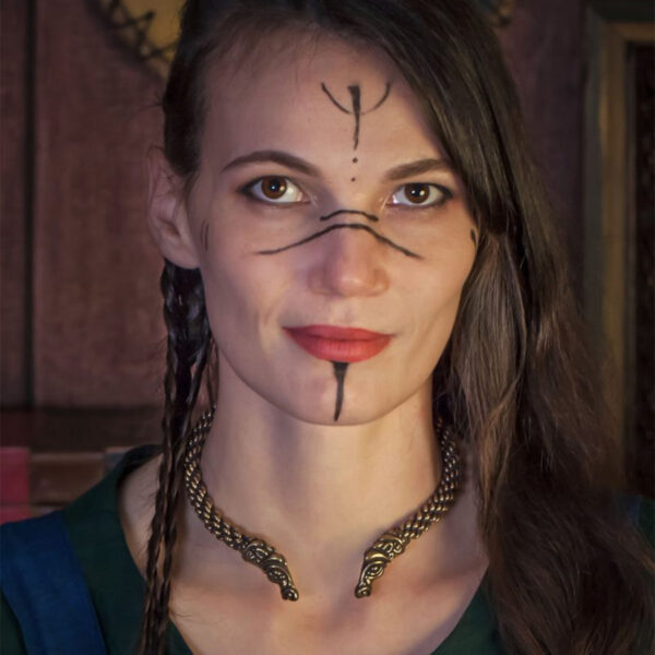 A woman wearing a Celtic Horse Neck Torc is posing for a picture.