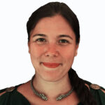 A woman wearing a green shirt and a Rabbit Torc Medium Braid necklace.