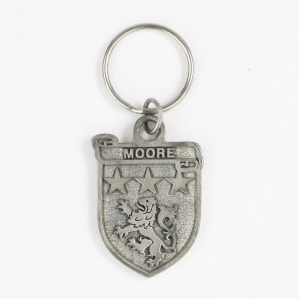 An Irish Coat of Arms keychain made of pewter, personalized with the name "Moore" on it, is called the Moore Irish Coat of Arms Key Chain.