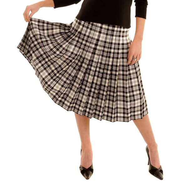 A woman is posing in a Fiona Skirt Light Weight 11oz Premium Wool.