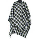 A black and white Tartan Serape - Homespun Wool Blend, crafted from a homespun wool blend, showcased on a mannequin.