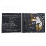 A cd with a picture of a woman on it.