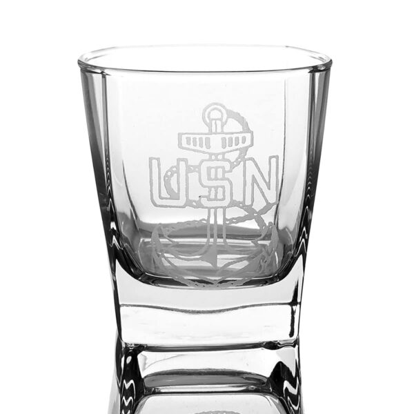 A US Navy Logo Etched Whisky Glass with the word USN engraved on it.