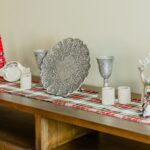 A reversible tartan Christmas mantel runner perfect for the festive season. The runner features a charming Christmas tree design and is made from homespun wool blend fabric.