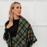 A woman in a Tartan Shawl - Poly Viscose Wool Free.