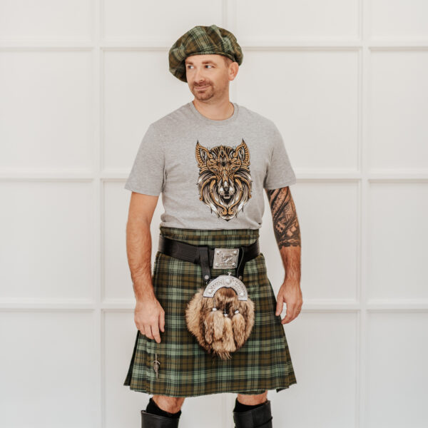 A man wearing a Quality Wool Blend Kilt with Matching Tartan Flashes and FREE Kilt Hanger.