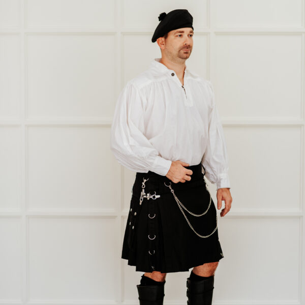 A man wearing a Khromed Kilt + Free Kilt Hanger.