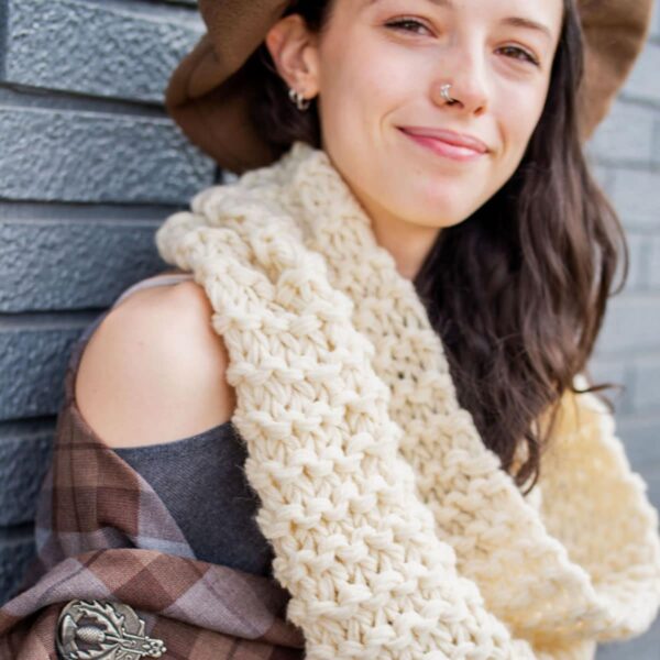 A woman wearing an OUTLANDER Inspired Custom-Made Hand-Knit Cowl.