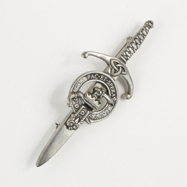 A silver sword with a Scottish crest and the Matheson Pewter Clan Crest Kilt Pin on it.