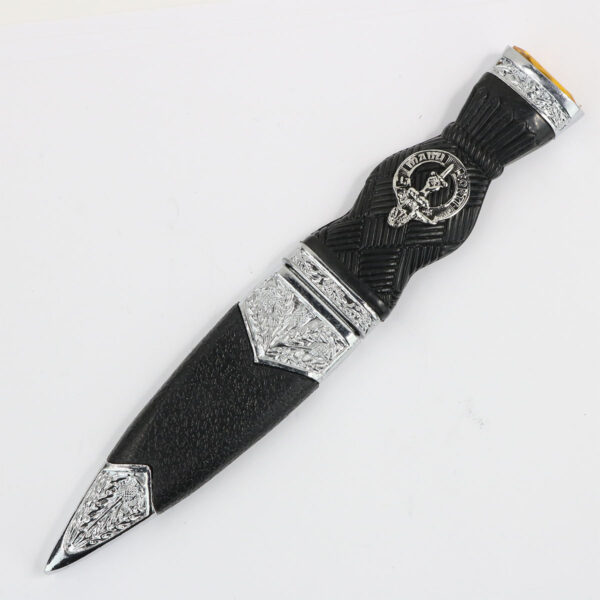 A MacKay Clan Crest Standard Sgian Dubh, placed on a white surface.