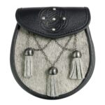 A Celtic Embossed Studded Premium Fur Sporran with tassels.