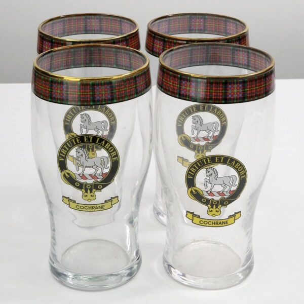 A set of four Gunn Clan Crest Tartan Pub Glasses - Set of 3, featuring the Gunn clan crest.