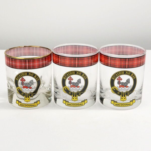 Three Thomson Clan Crest Tartan whisky glasses, perfect for sipping whisky.