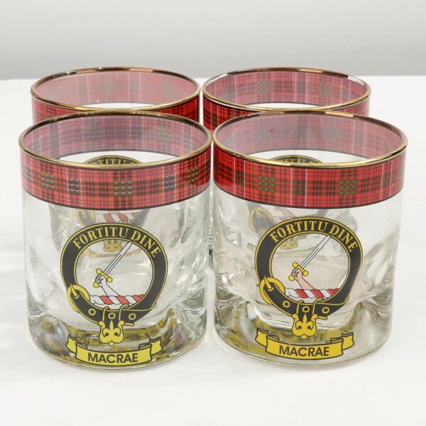 A set of five MacIntyre Clan Crest Tartan whisky glasses.