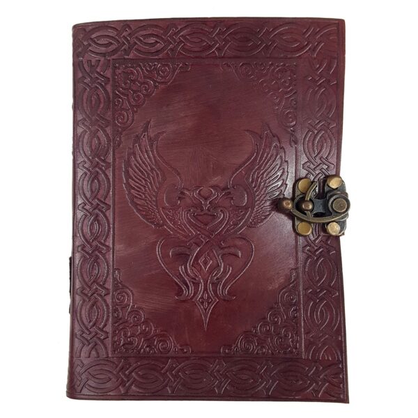 A brown Leather-Bound Celtic Love Birds journal adorned with an eagle, perfect for recording love stories or cherished thoughts.