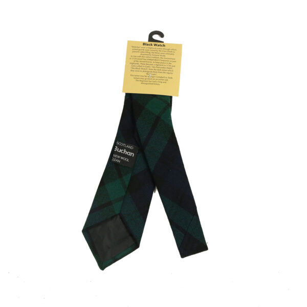 A Black Watch Modern Child Size Tartan Tie - Spring Weight with a tag on it.