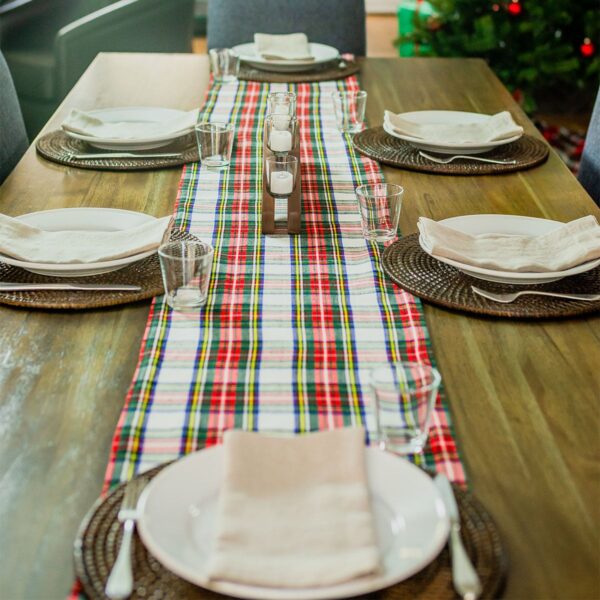 The Reversible Tartan Table Runner - Homespun Wool Blend on a wooden table.