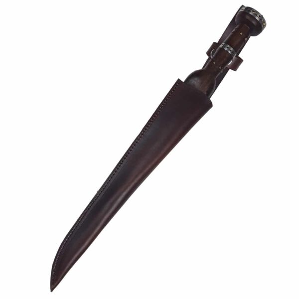 A Damascus Ebony dirk with a black handle on a white background.