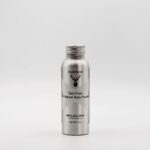 A Nutdust -Wildling body powder on a white background.