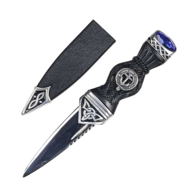 A Celtic Knot Clan Crest Sgian Dubh with a black handle and a blue stone.