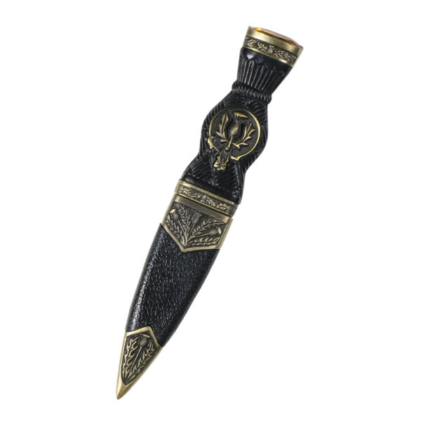 A standard Thistle Sgian Dubh Bronze Finish Yellow Gem Top knife on a white background.