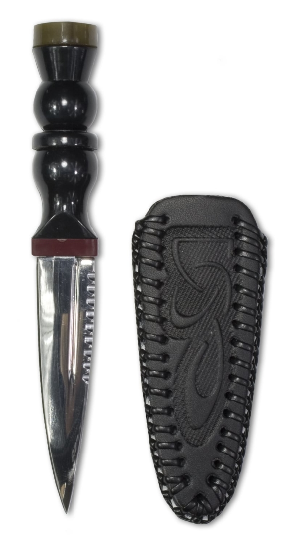 A faux Blackwood sgian dubh with a leather sheath next to it.