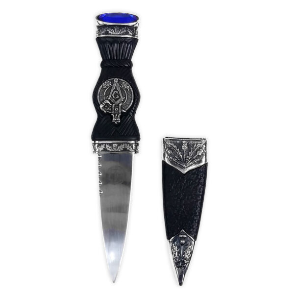 A Masonic Sgian Dubh with a blue stone on it.