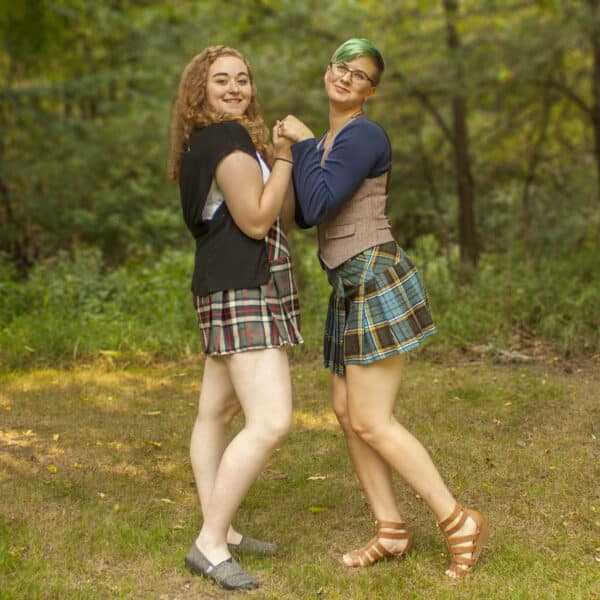 Two women in Premium Wool-Free Kid Kilts posing for a picture.
