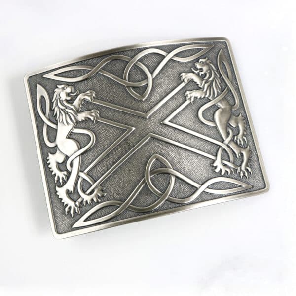 A silver belt buckle with two lions on it.